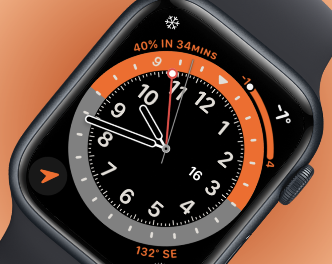 GMT watch face with orange background and orange highlights